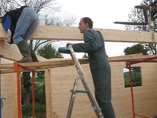 maison bois pose poutre