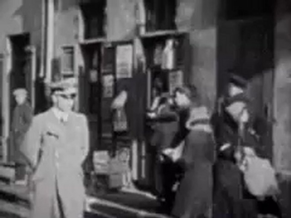 Nazis bullying people in the Warsaw ghetto
