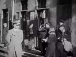 Nazis bullying people in the Warsaw ghetto