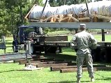 Broken mast from the U.S.S. Oklahoma arrives in Muskogee