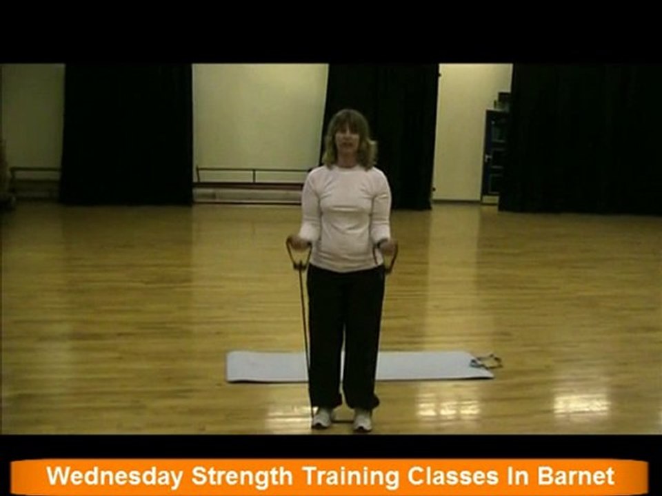 Personal Trainer North London shows bicep curls to strength