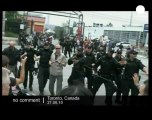 Police face-off against protesters outside... - no comment