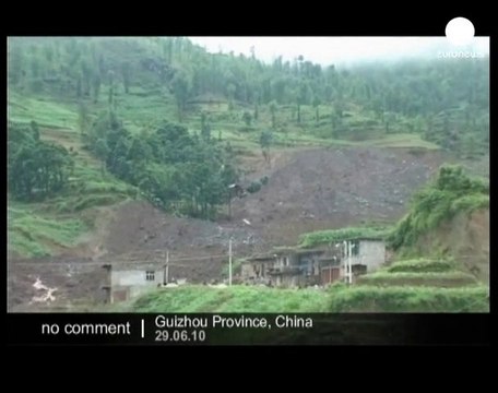 China: looking for survivors of a landslide - no comment