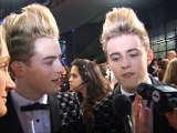 Jedward's Edward falls while on stage at T4 gig