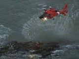 Coast Guard rescues three children stranded on rocks