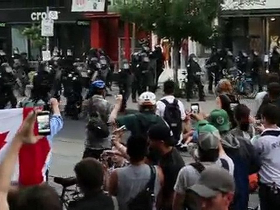 Cops Charge Protesters at Queen and Spadina