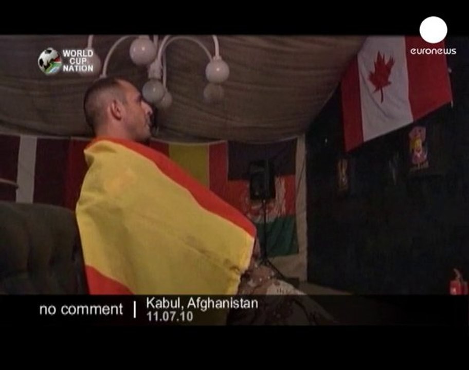 Dutch and Spanish troops watch World Cup... - no comment