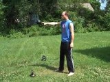 Kettlebell Swings: One Arm Swings Behind Leg