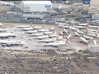 Strikes and ash cloud sends BA into the red