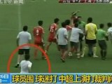 Chinese football fan karate kicks ref