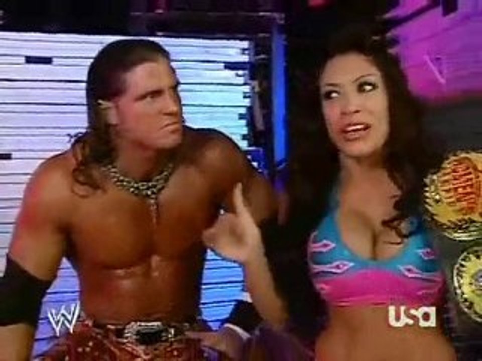 Melina (c) and Jonny Nitro backstage