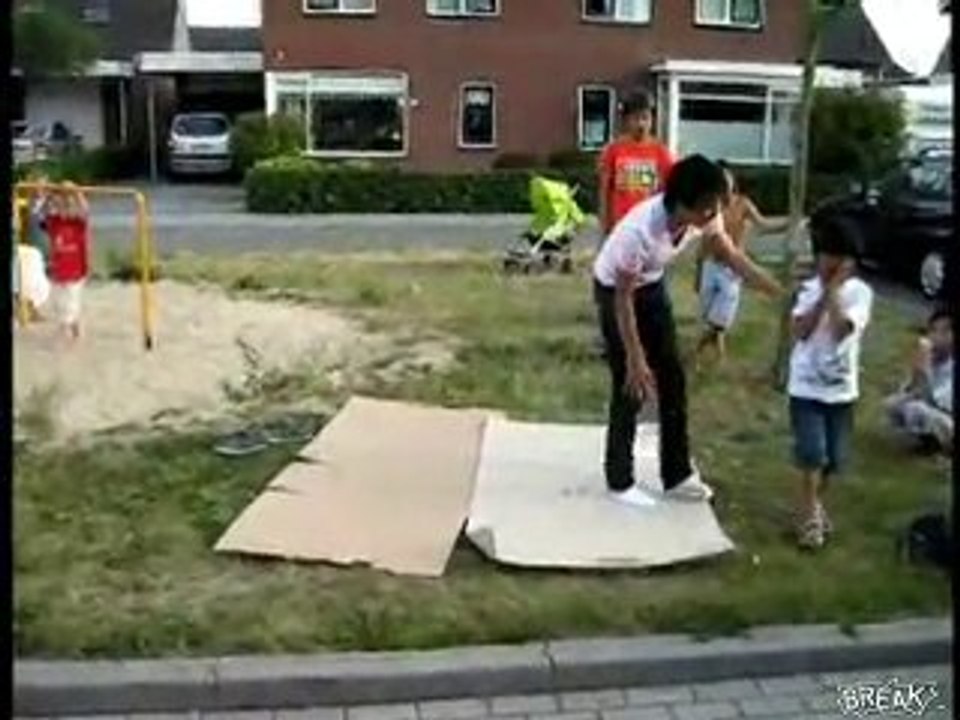 B-Boy Accidentally Kicks Kid In The Head!
