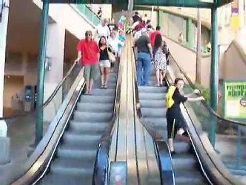 Sliding Down Between Escalators 100731