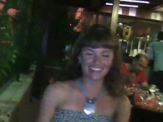 next to the bar stand