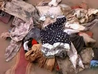 Pakistani President returns home to floods