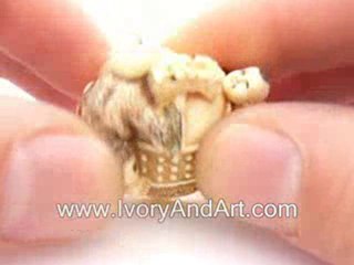 Mammoth ivory netsuke - 2 Children on Dragon Bell