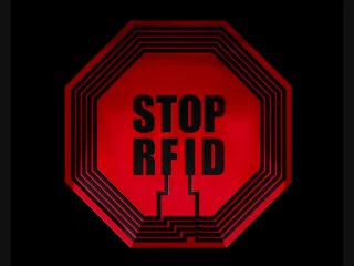 DANGER LA PUCE RFID NOUS FICHE COMME DU BETAIL