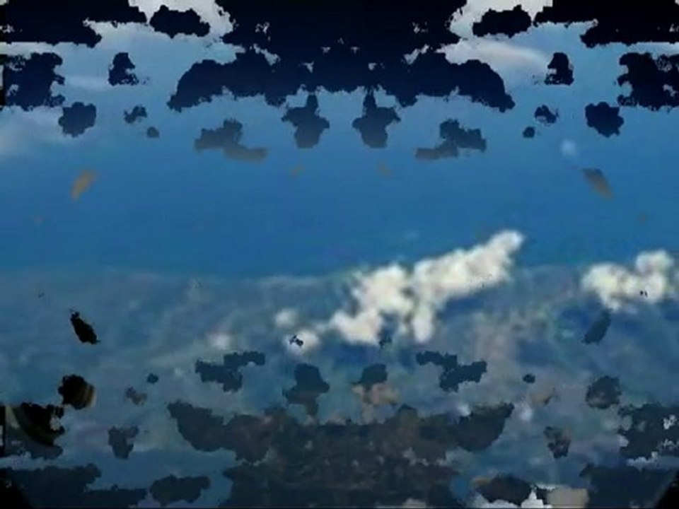 Daytime UFO recorded from plane over Tokyo - 5 June 2010