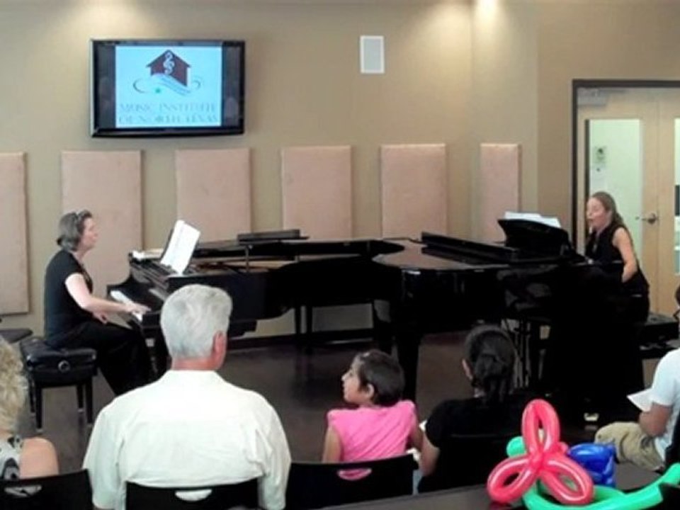 Ms. Zharkova and Ms. Teppo playing Danse Macabre