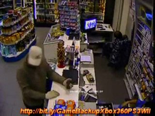 Lazy Store Clerk Sits During Robbery