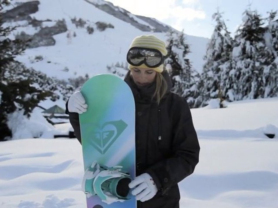 Torah Bright rides the Eminence Roxy Snowboard