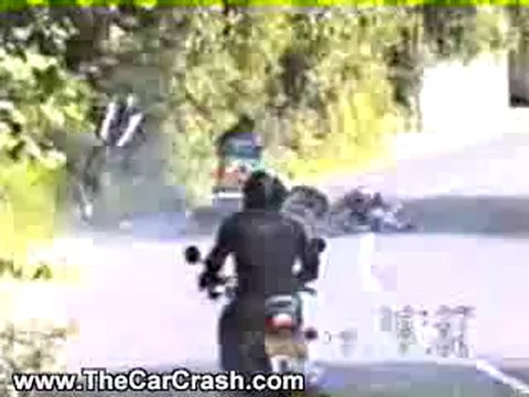 The Car Crash: Guy on a Motorcycle Crashes