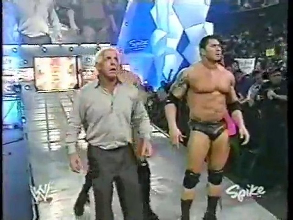 the rock returns to help mick foley against evolution