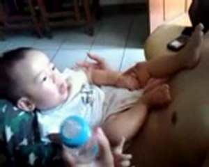 8 months baby kicks hard his father