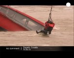 Dramatic rescue of a man from sinking boat - no comment