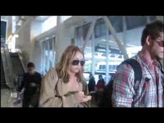 Miley Cyrus Covers Her Assets!