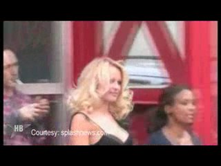 Pamela Anderson Romances Dev Patel