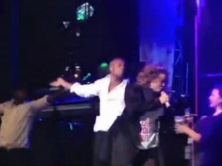 Mariah Carey falls over on stage in Singapore