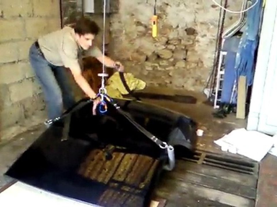 lévé son hard-top avec un palan électrique