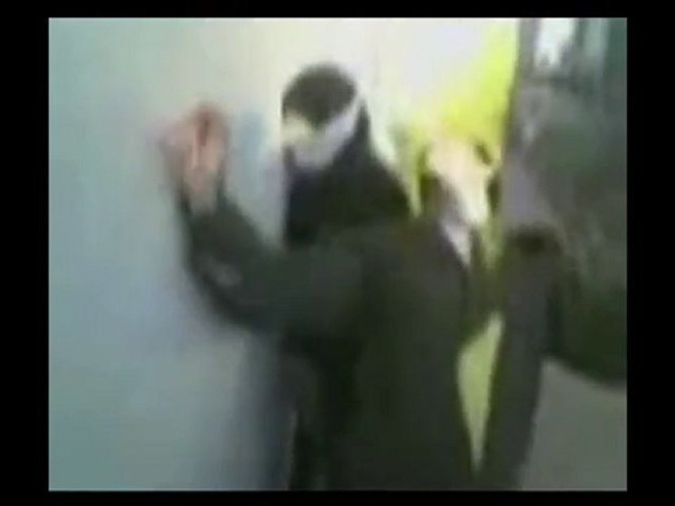 Israeli soldier dancing around blindfolded woman