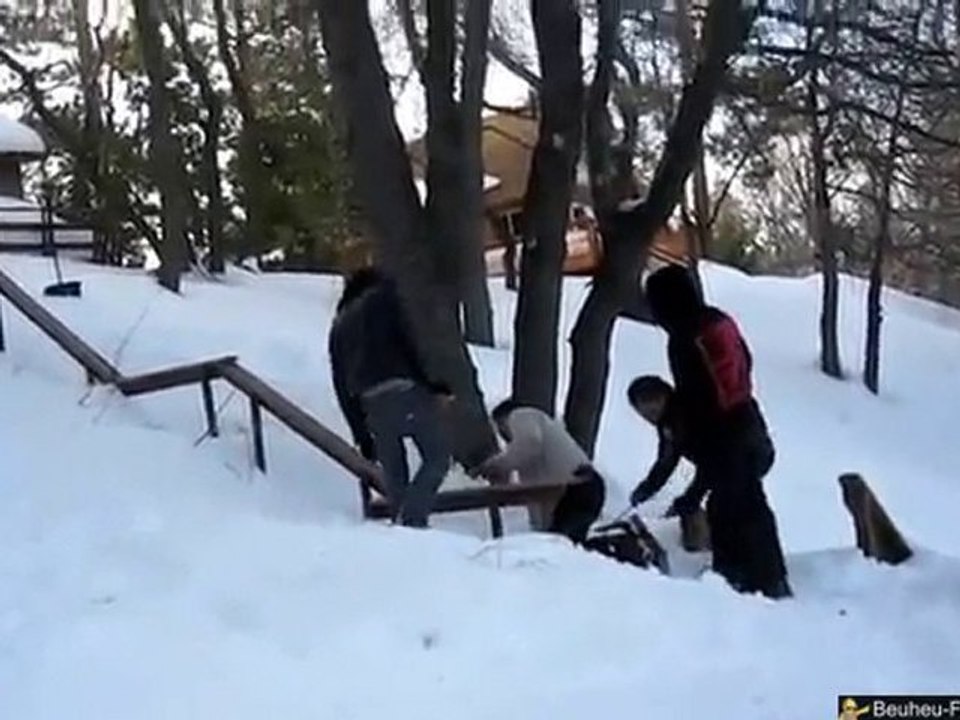 Double ramassage en snowboard