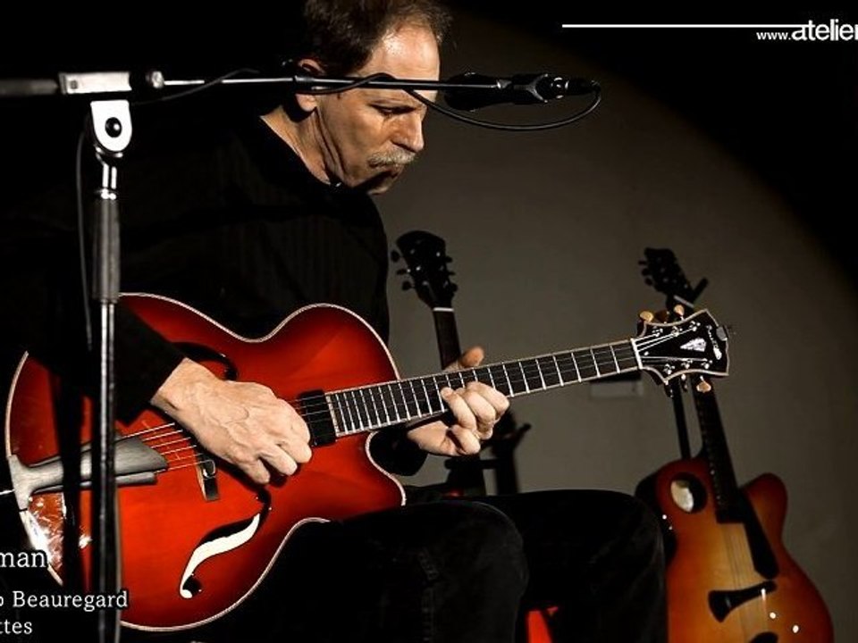 red guitar collection Mario Beauregard