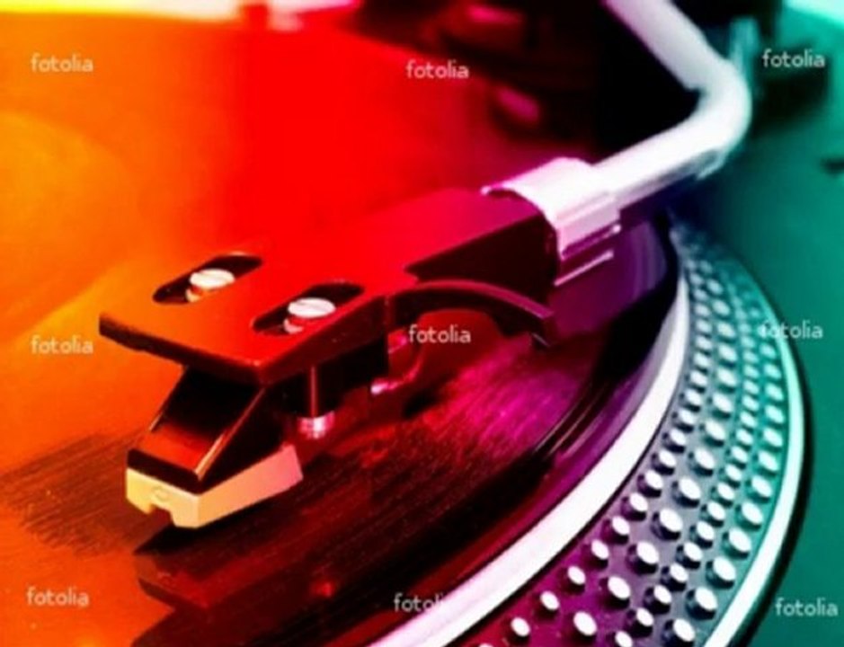 SITTING AT THE DJ BOOTH