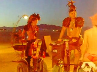 Hot Burner couple on segways at The Crossroads