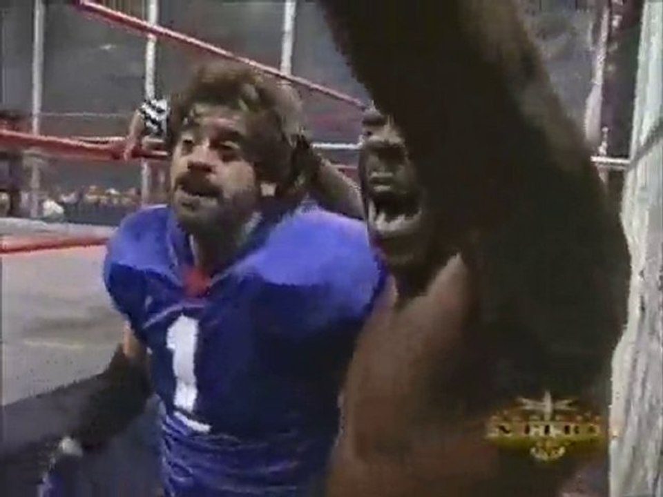 Goldberg spears Russo through the Cage