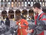 Italy travel: Venices St. Marks Square feeding pigeons, part