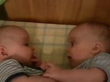 Twin Baby Boys Laughing at Each Other