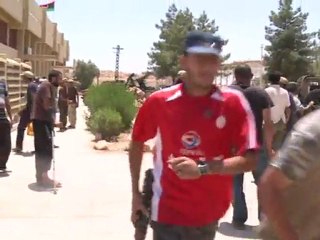 Libya rebels retake hamlet in heavy fighting