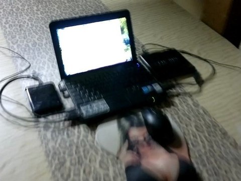 Dépannage d'un PC ultra portable notebook MSI U100,reinstallation du systeme avec graveur externe USB puis test sous Performance test en charmante compagnie d'une coquine tres sexy mon superbe tapis de souris