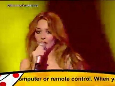 Kylie Minogue performing step back in time at BBC children in need