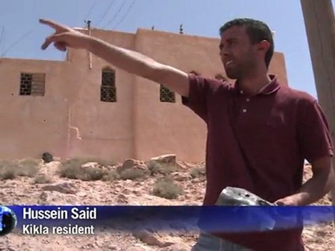 Arabic-Web-Libyan front line village braves daily onslaught