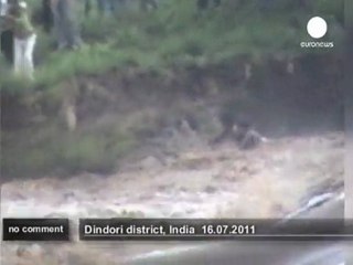 Download Video: Four year-old boy rescued from flood water - no comment