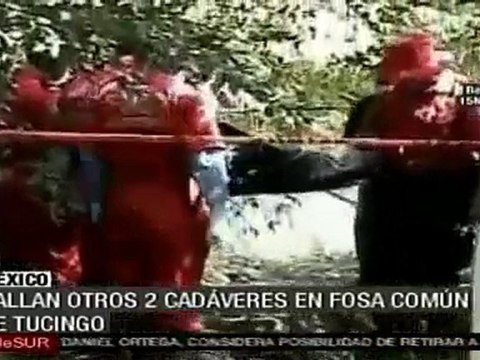 Hallan dos cadáveres más en fosa común de Tucingo, México