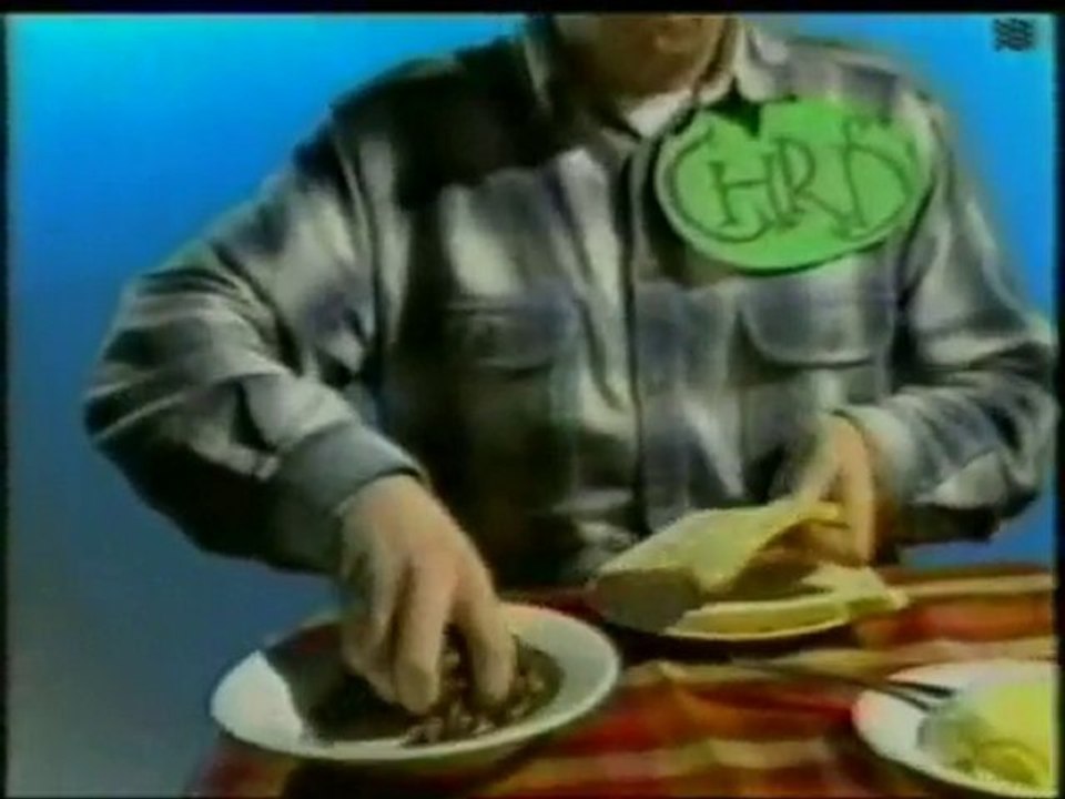 Man eating a worm sandwich
