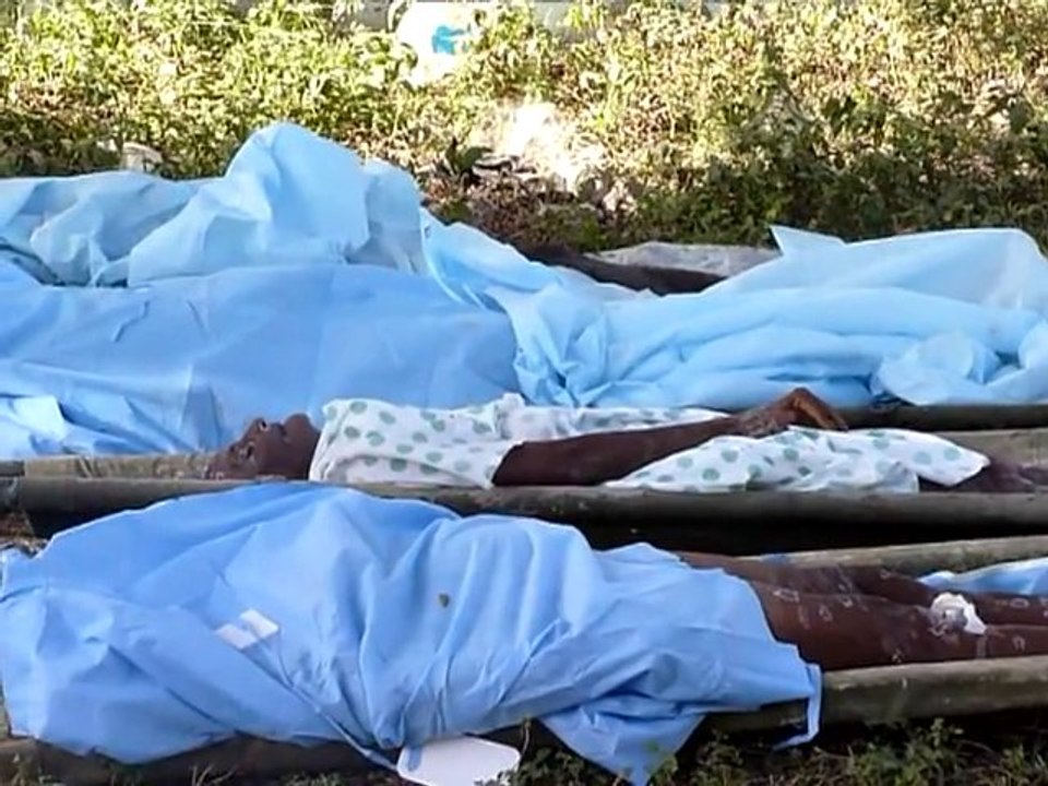 Haitian cholera hospital counts its dead on the lawn