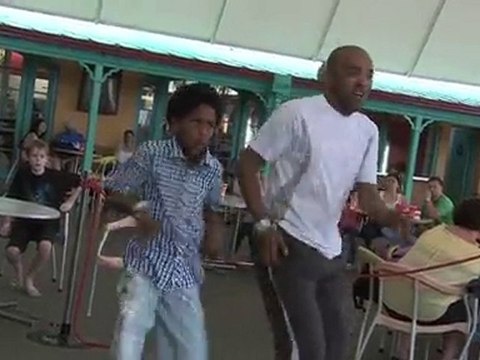 Father and son playing Kinect Sport for Xbox 360